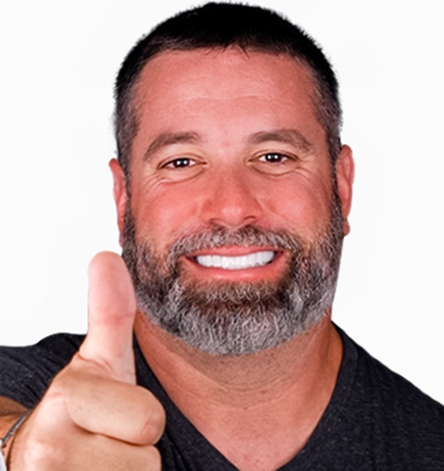 Photographic evidence of the improvement in dental appearance from All-on-4 implants by Esthetic Dentistry, before and after treatment.